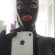 Selfie d'une femme en cagoule latex